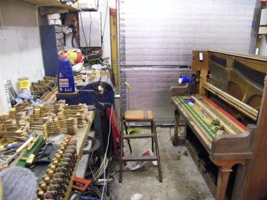 A pianola in the middle of restoration
